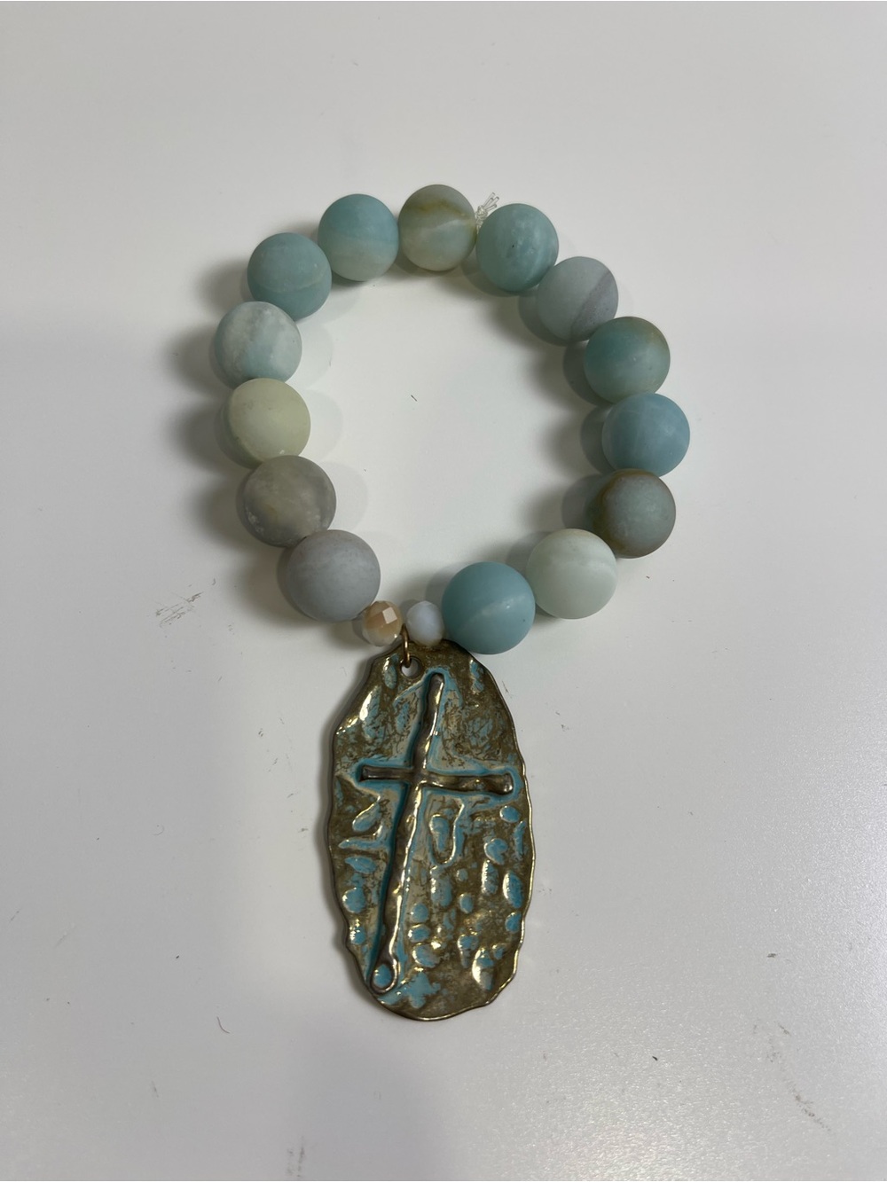 Matte Aqua Bead Stretch Bracelet with Textured Cross Pendant